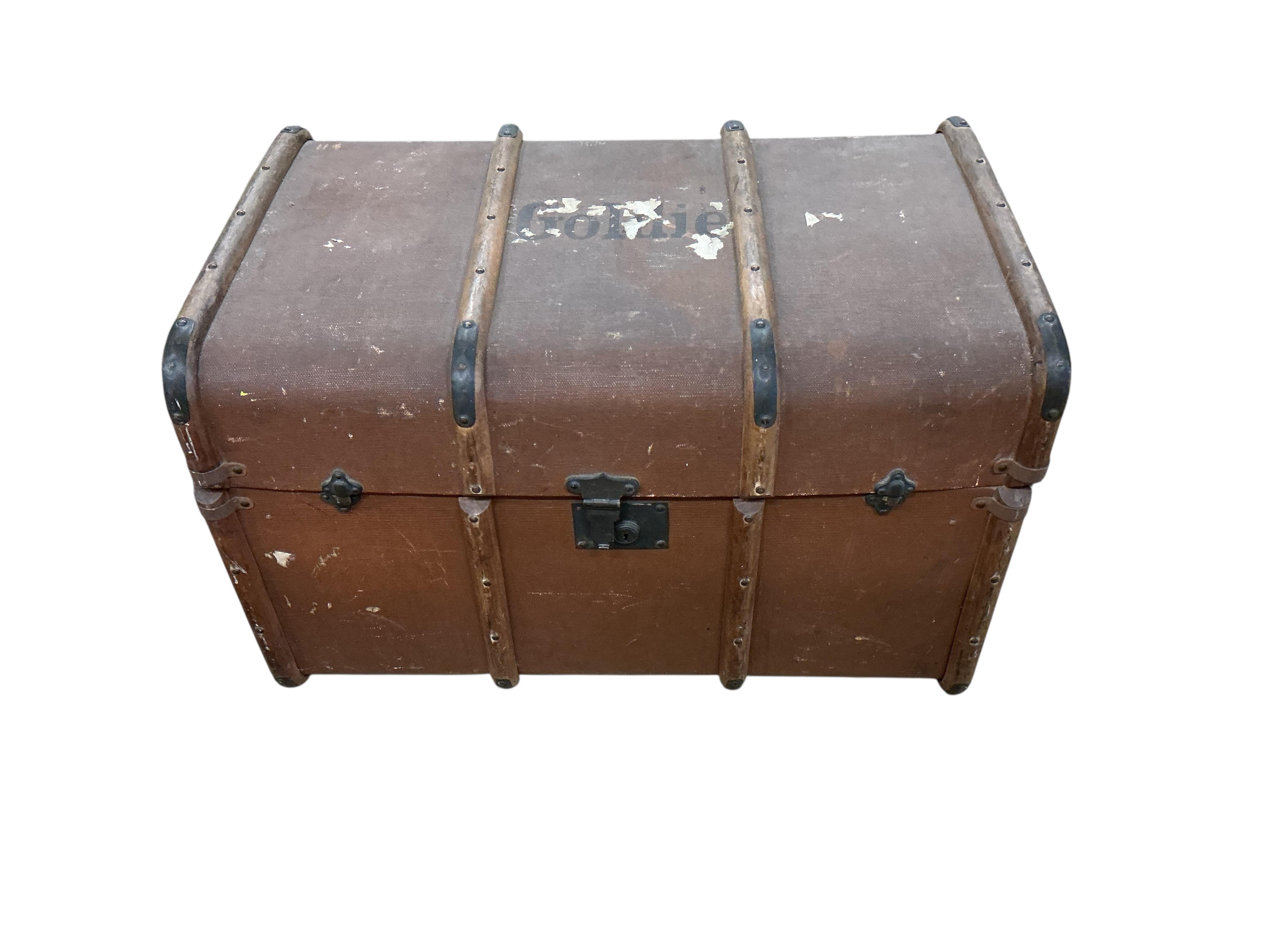 A Victorian painted tin trunk, width 60cm, depth 40cm, height 36cm together with a later larger canvas covered trunk